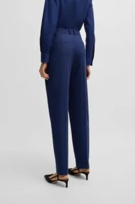 Pantalones regular fit de paño elástico con corte cónico